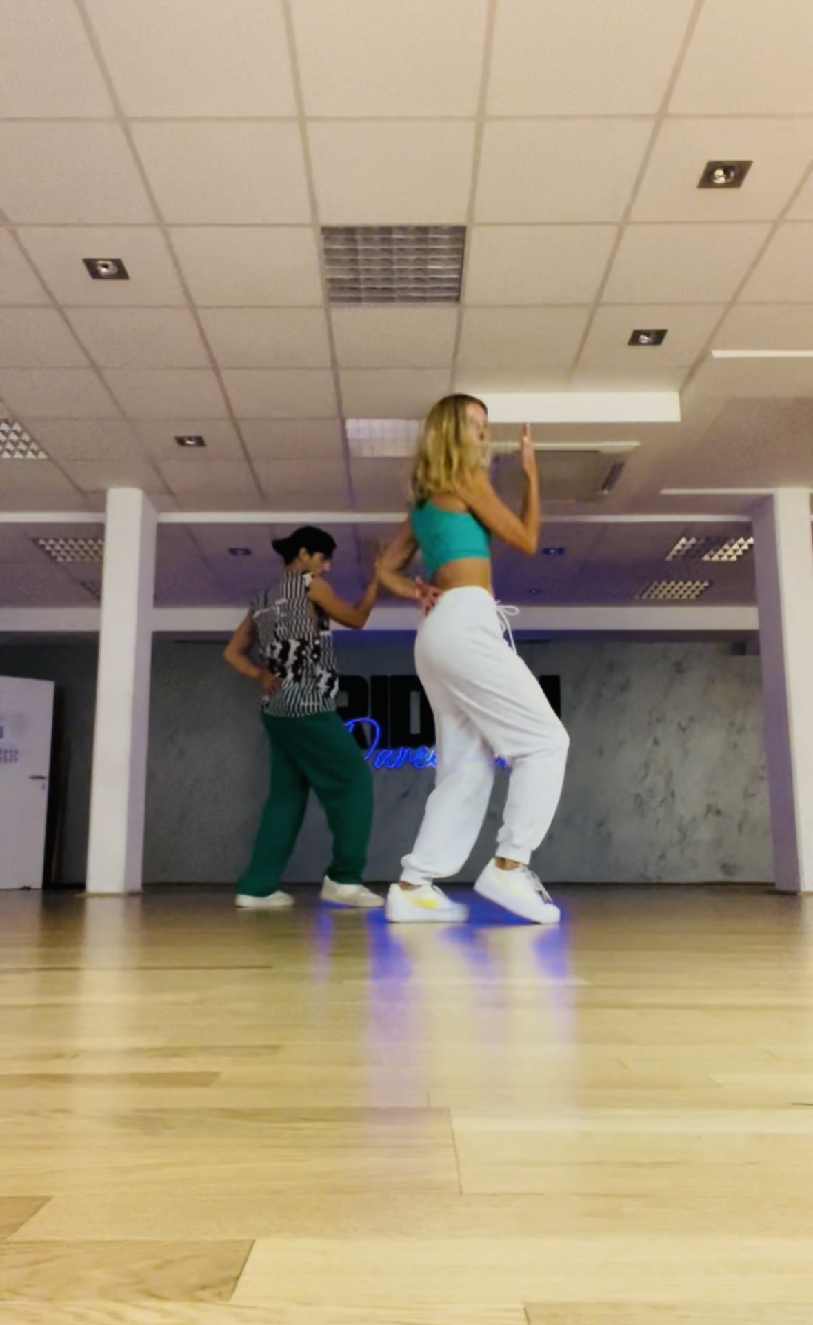 Dancers grooving through a hip hop routine in the studio